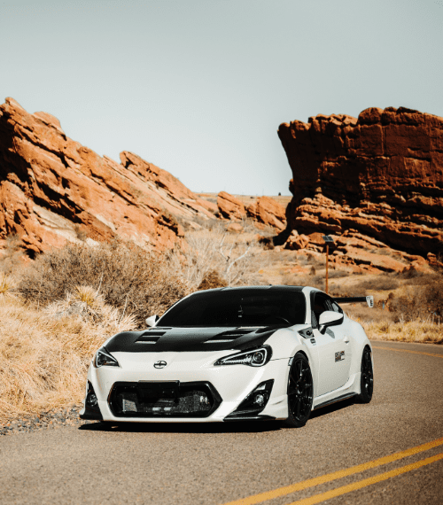 A highly modified Subaru BRZ in a desert environment 