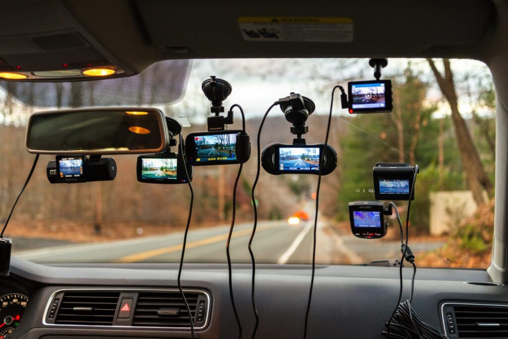 Multiple Dash Cams installed in a car.