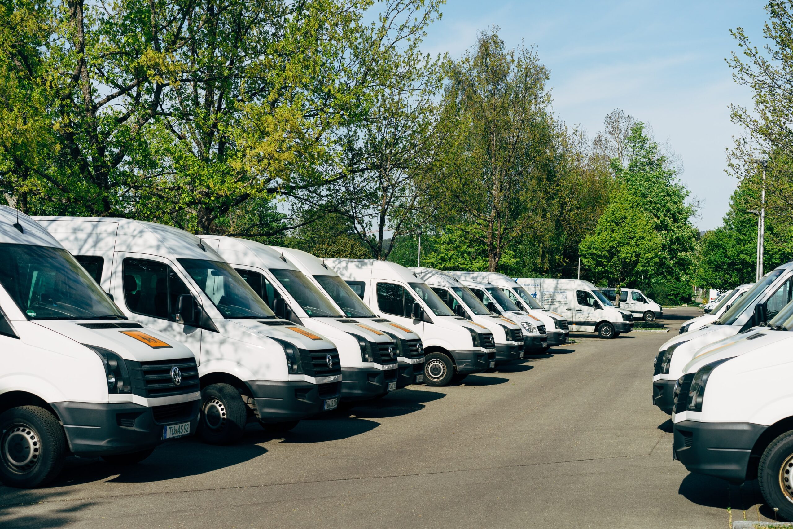 A fleet of servicing vans to illustrate fleet services.