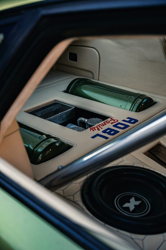 Upgraded speaker in a car door panel