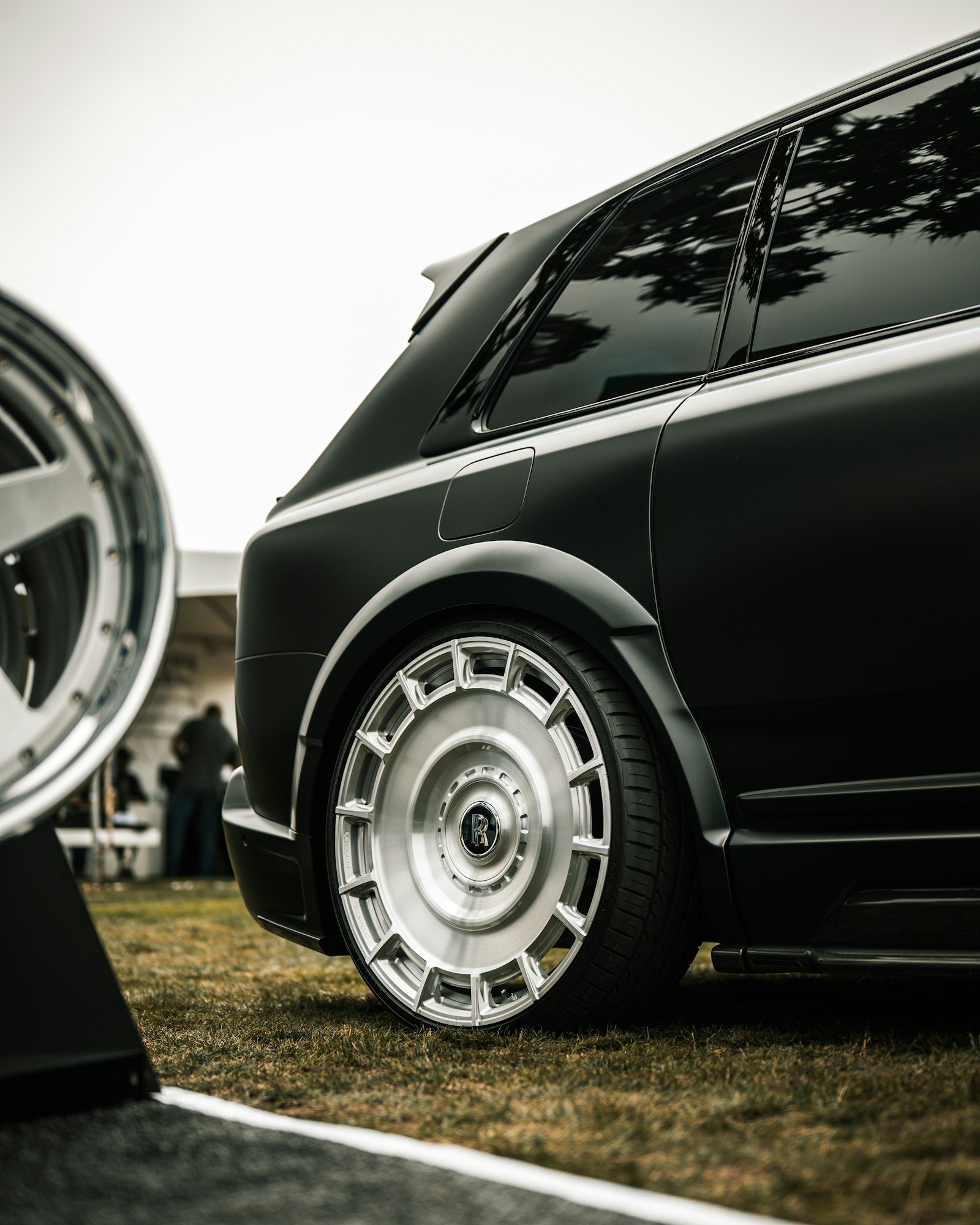 Custom wheel on a black luxury vehicle